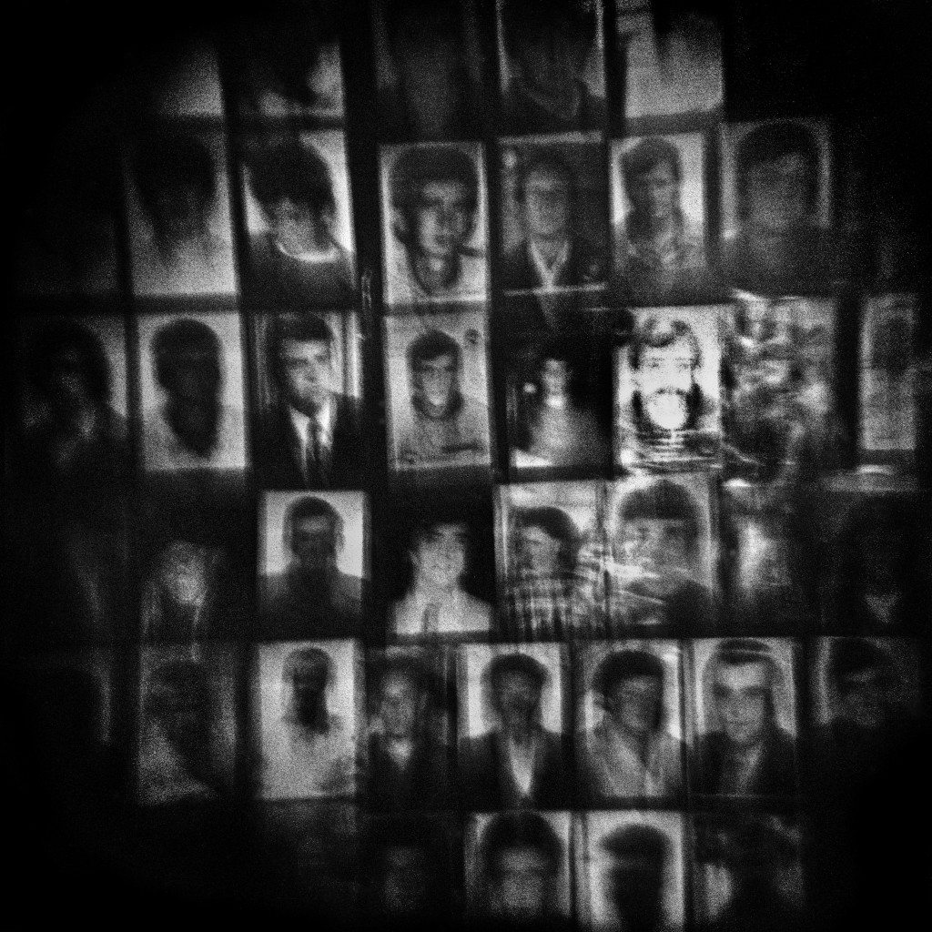 The images of missing persons from Srebrenicacan be seen on a placard of the organization 'Mothers of Srebrenica' during their monthly rally in Tuzla.
